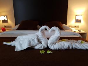 Postel nebo postele na pokoji v ubytování Hotel Ortuella