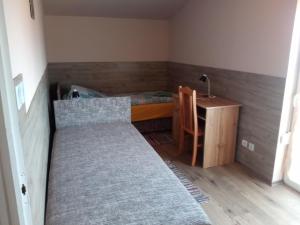 Postel nebo postele na pokoji v ubytování Budai Vám Apartmanház