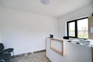 TV a/nebo společenská místnost v ubytování Hotel Ema&Zain