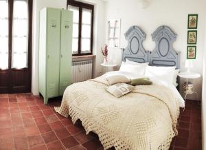 En eller flere senge i et værelse på Il Poggio B&B