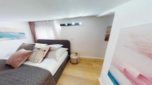 Postel nebo postele na pokoji v ubytování Villa Nono Penthouse Apartment