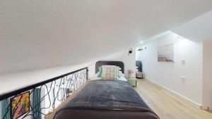Postel nebo postele na pokoji v ubytování Villa Nono Penthouse Apartment