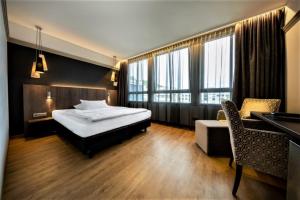 Postel nebo postele na pokoji v ubytování Kronenhotel + 37 fotografií