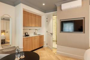 A kitchen or kitchenette at Aparthotel Hattem