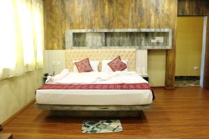 Katil atau katil-katil dalam bilik di Hotel Himalaya