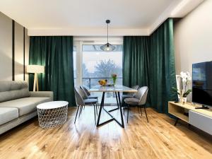 Posedenie v ubytovaní Apartament Bóżnicza