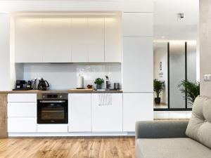 Kuchyňa alebo kuchynka v ubytovaní Apartament Bóżnicza