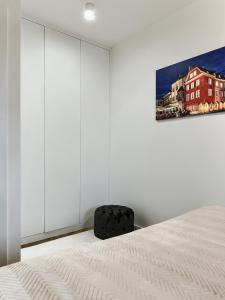 Posteľ alebo postele v izbe v ubytovaní Apartament Bóżnicza
