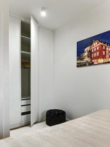 Posteľ alebo postele v izbe v ubytovaní Apartament Bóżnicza