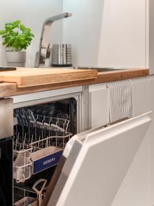 Kuchyňa alebo kuchynka v ubytovaní Apartament Bóżnicza