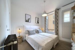 Postel nebo postele na pokoji v ubytování Cannes Luxury Rental - Apartment City Center