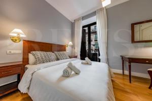 Posteľ alebo postele v izbe v ubytovaní Uncibay Deluxe