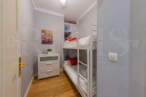 Posteľ alebo postele v izbe v ubytovaní Uncibay Deluxe