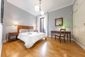 Posteľ alebo postele v izbe v ubytovaní Uncibay Deluxe