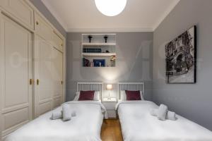 Posteľ alebo postele v izbe v ubytovaní Uncibay Deluxe