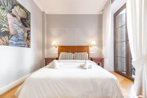 Posteľ alebo postele v izbe v ubytovaní Uncibay Deluxe
