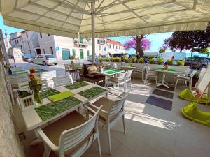 Restavracija oz. druge možnosti za prehrano v nastanitvi Benjamin Hotel