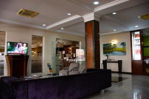 Khu vực lounge/bar tại Hotel Exclusivo
