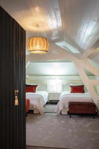 Cama ou camas em um quarto em Casa da Granja Boutique