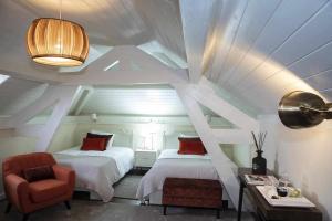 Cama ou camas em um quarto em Casa da Granja Boutique