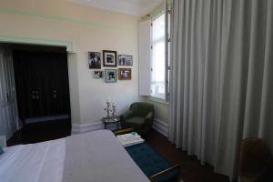 Cama ou camas em um quarto em Casa da Granja Boutique
