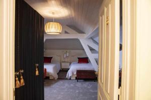 Cama ou camas em um quarto em Casa da Granja Boutique
