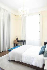 Cama ou camas em um quarto em Casa da Granja Boutique