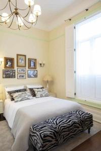 Cama ou camas em um quarto em Casa da Granja Boutique