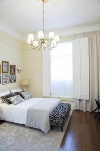 Cama ou camas em um quarto em Casa da Granja Boutique