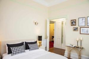 Cama ou camas em um quarto em Casa da Granja Boutique
