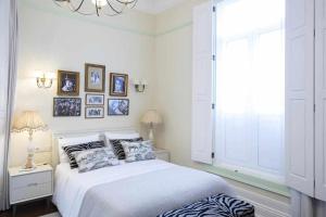 Cama ou camas em um quarto em Casa da Granja Boutique