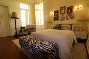 Cama ou camas em um quarto em Casa da Granja Boutique