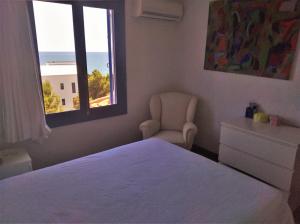 Llit o llits en una habitació de Auténtica Casa Mediterránea con vistas al mar