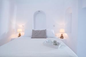 Un pat sau paturi într-o cameră la Gaia Villa