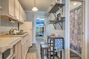 a kitchen with a sink and a counter at 1 Mi to Beach Waterfront Retreat in Ocean City in Ocean City