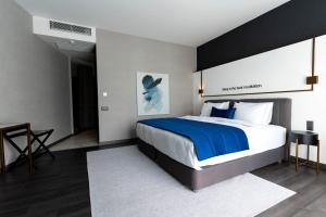 Postel nebo postele na pokoji v ubytování Hotel Bonvie