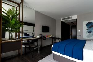 TV a/nebo společenská místnost v ubytování Hotel Bonvie