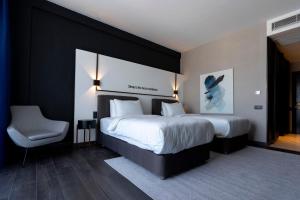 Postel nebo postele na pokoji v ubytování Hotel Bonvie