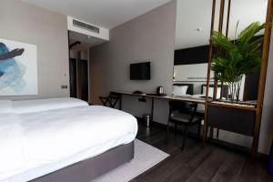 Postel nebo postele na pokoji v ubytování Hotel Bonvie