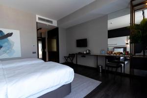 Postel nebo postele na pokoji v ubytování Hotel Bonvie