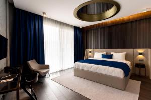 Postel nebo postele na pokoji v ubytování Hotel Bonvie