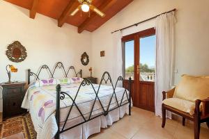 Postel nebo postele na pokoji v ubytování Finca Diver + 23 fotografií