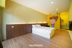 Llit o llits en una habitació de 我們這一家輕旅宿