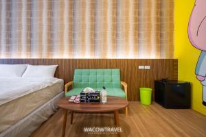 Llit o llits en una habitació de 我們這一家輕旅宿