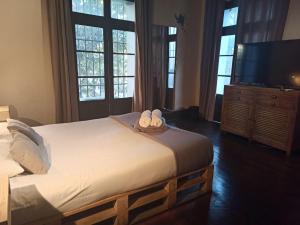 Cama ou camas em um quarto em Hostel Boutique Merced 88