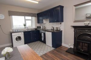 Dapur atau dapur kecil di Atlantic View Apartment