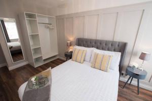 Katil atau katil-katil dalam bilik di Atlantic View Apartment