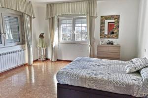 Un pat sau paturi într-o cameră la Casa Fonte Barreira - Camariñas