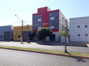 a building on the side of a street at Hotel Jardim do Cedro in Cedral