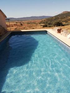 Poolen vid eller i närheten av Casa Rural en El Cerro Del Búho